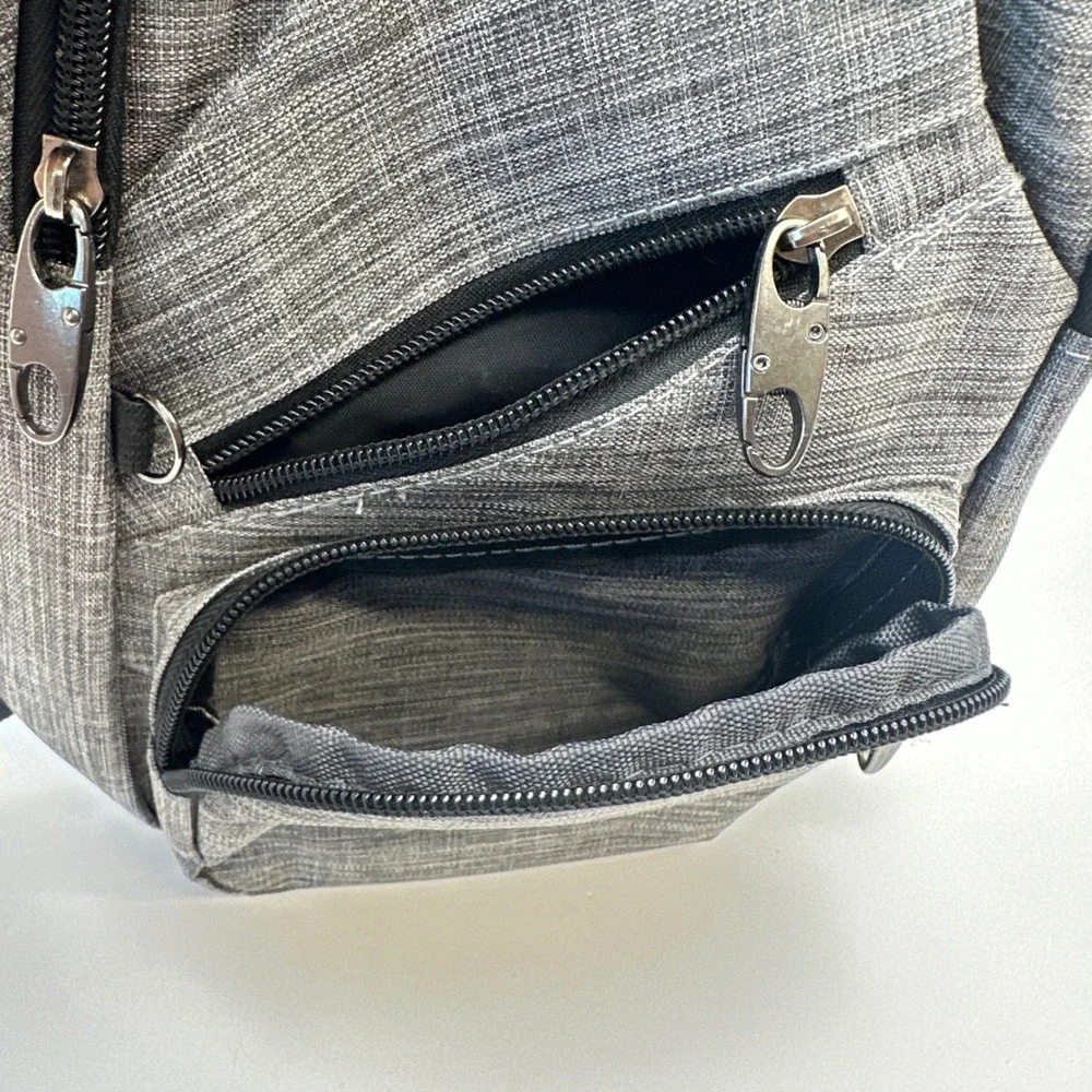 NuPouch Gray Crossbody Sling Bag with USB Charging Port Travel Tech Backpack
